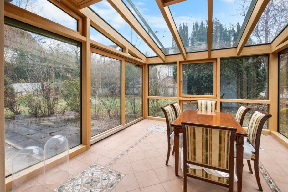 Wintergarten mit flie�endem �bergang zur Terrasse Einfamilienhaus Bischberg