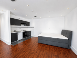 Hauptbild Modernes Apartment mit Einbauk�che und heller Fensterfront