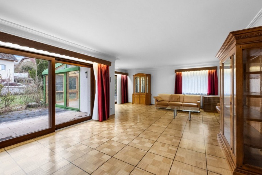 Wintergarten mit flie�endem �bergang zur Terrasse Einfamilienhaus Bischberg
